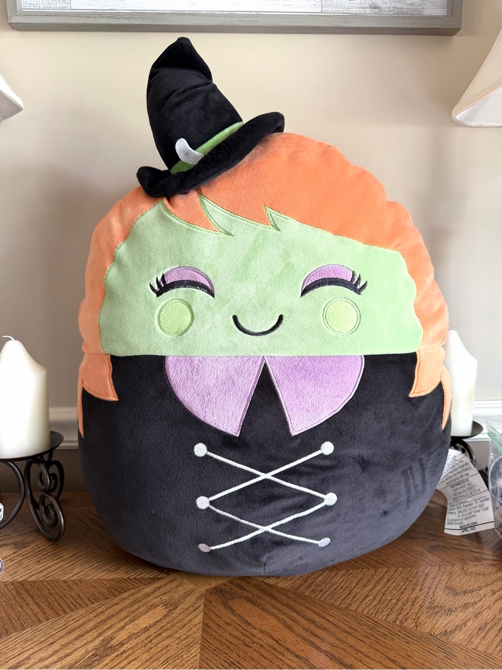 22” Mariposa Extra Large Witch squish pillow in orange green purple and black